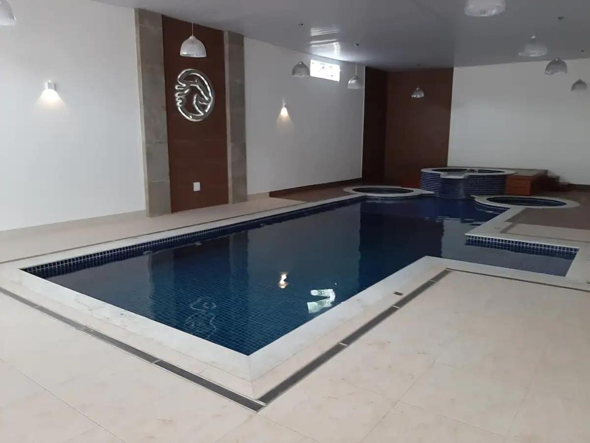 Agradavel Flat - Cavalinho Branco - Aguas De Lindoia Apartment ภายนอก รูปภาพ